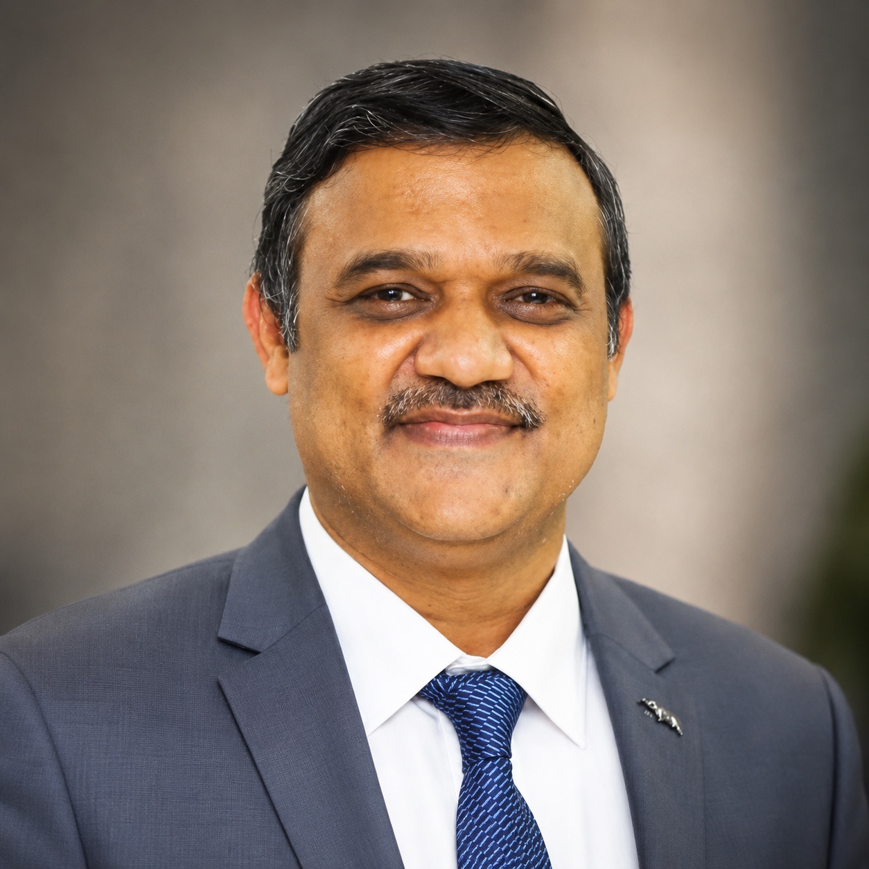 Dr Dinesh Katre